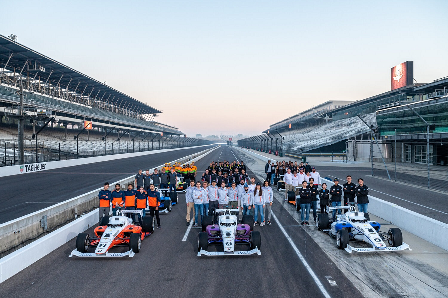 Photo 1. Nine teams that competed at the first Indy Autonomous Challenge on October 23, 2021. (KAIST team is the right most team in the front row)